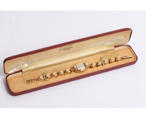 A 9ct gold vintage Tudor Rolex ladys wrist watch, the gold graduating strap stamped Rolex, the dial Tudor Royal
