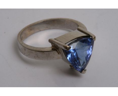 An 18ct white gold tanzanite ring, triangular cut, approx 5ct.
