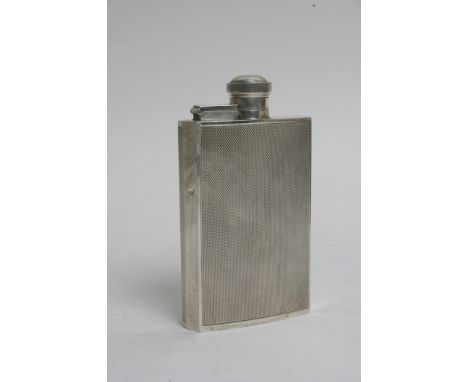 A silver hip flask having Sheffield hallmarks. 