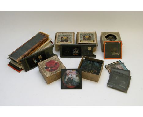 A box containing coloured magic lantern slides