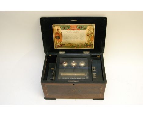 A Victorian rosewood and inlaid music box, playing eight airs with sequence of bells. original Visible Bells (two broken teet