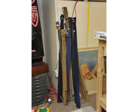 A collection of vintage fishing rods in canvas cases, six Bruce Walker, one Bob Church, one Billy Lane and one other (9)