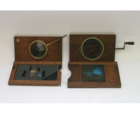A mechanical magic lantern slide depicting a swan and three other mechanical automation slides