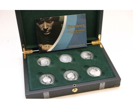 Six Silver New Zealand Lord of  the Rings in a fitted case