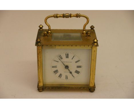 A brass cased carriage clock the rectangular dial with makers name A Smith Croydon 
