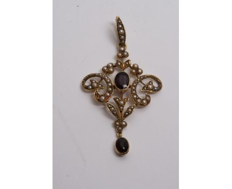 An Edwardian amerthist and seed pearl, 15ct gold brooch (one seed pearl missing)