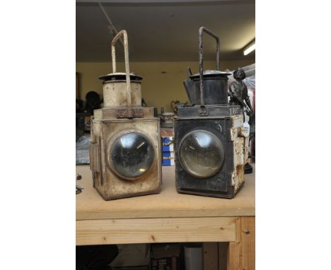 An original pair of vintage railway lamps