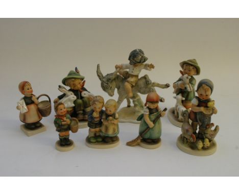 A Collection of Eight Goebel figures