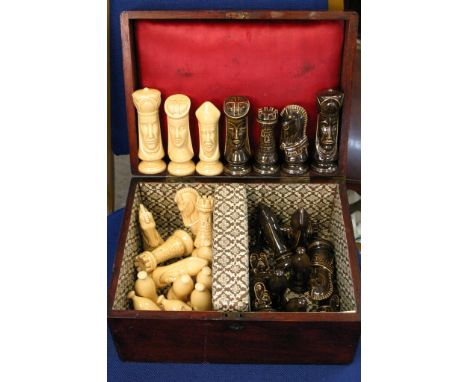 A Vintage mahogany wooden box with complete set of ceramic chess pieces with no damage 