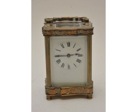 A brass cased carriage clock