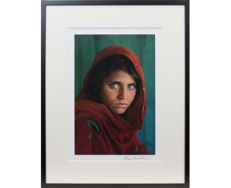 STEVE MCCURRY (AMERICAN b. 1950),SHARBAT GULA, AFGHAN GIRL, PAKISTANoffset lithographic colour print, signed lower right in p