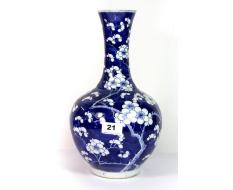 A 19th century Chinese hand painted porcelain vase, four character mark to base, prunus pattern (H. 32cm), slight fritting to