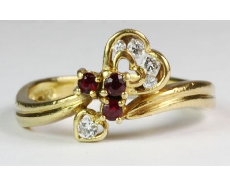 A lovely 18ct yellow gold (stamped 750) ruby and diamond set ring (M.5).