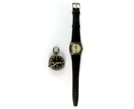 A vintage gentleman's Swiss made wristwatch and a pocket compass.