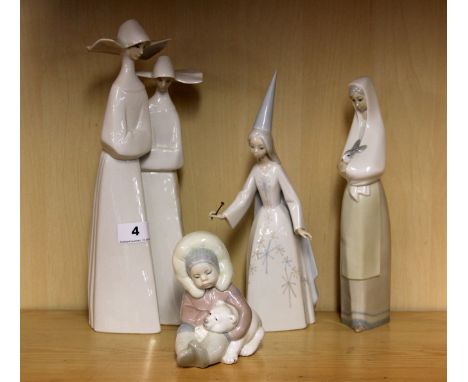 Three Lladro figures and a Nao figure of a girl with a rabbit.