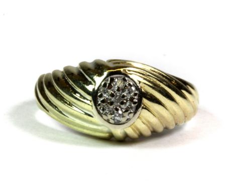 A yellow metal (tested minimum 9ct gold) diamond set ring (K.5).