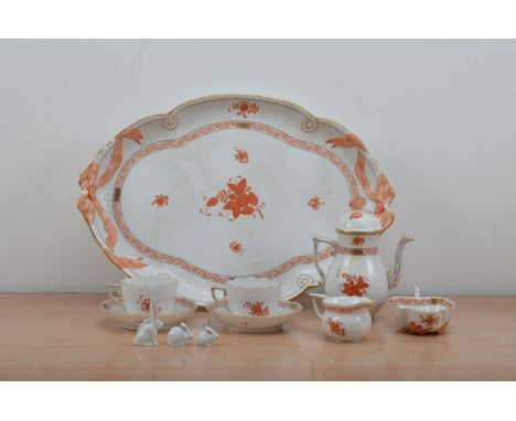 A Herend porcelain tea service for two, white ground with red floral design with heightened gilt, marked to the undersides, t