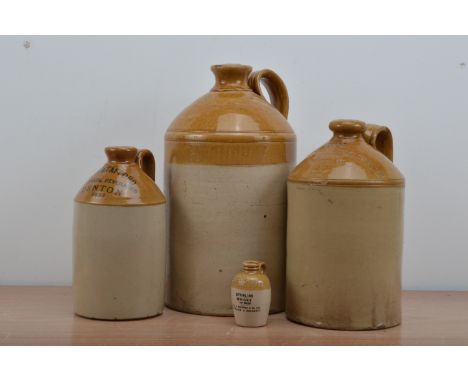Four 19th century and later ceramic two tone alcohol advertising  bottles, of differing sizes, the largest 40cm H AF (4) 