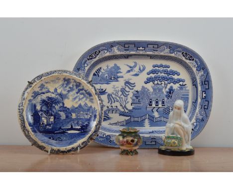 A large blue and white transferware  platter,  willow pattern, 47cm wide, together with a smaller transferware wall mounted p