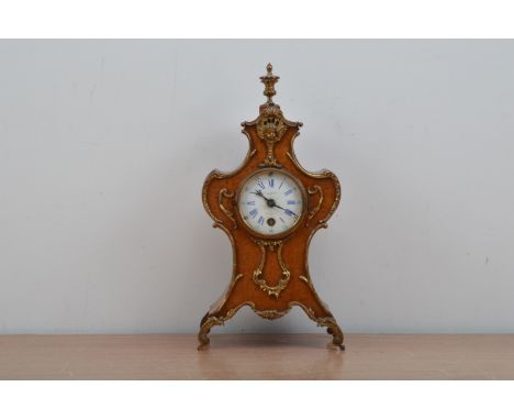 A Burr walnut and metal mounted mantel clock, the enamel dial with Roman numerals, cracked and marked R.L. Christie, Bank St.