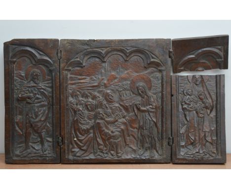 An 18th century and later wooden foldable triptych, possibly from a coffer, the panels depicting religious scenes of Christ, 