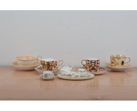 A collection of five 19th century and later ceramic cups and saucers, comprising examples, by Copeland, Coalport, Meissen, Ro