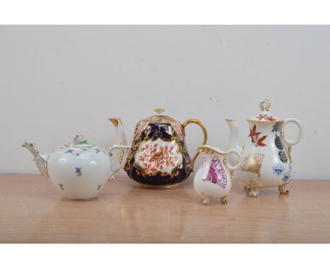 Two ceramic  teapots, comprising a Copeland China Imari pattern example, 14cm high and a Herend porcelain example, with flora