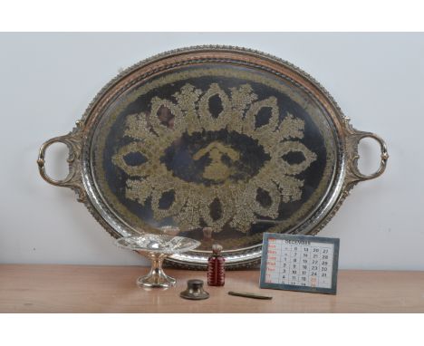 A collection of silver and silver plate, comprising a large plated twin handled tray, with a central crest and monogram, 77cm