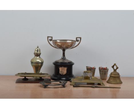 A collection of works of art, including a brass possibly French page turner, 26cm in length, a brass inkwell, a silver plate 