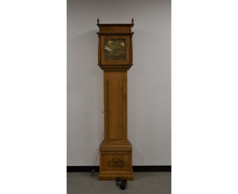 A modern oak longcase clock, brass dial with Roman numerals, with date dial, makers name Tho. Buttock of Bath, plaque inside 