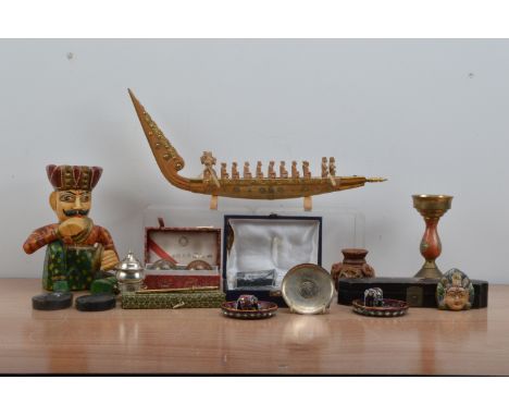 A collection of mostly modern Far Eastern items, including tourist pieces, a coin in a white metal tray, candlestick, lacquer