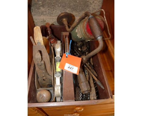 A plastic tray of old woodworking tools, an old lamp, a brace and bit, etc.