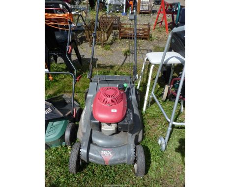A "Honda" HRX537 lawn mower with selectable mulching action, engine running at time of lotting.