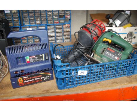 A "Bosch" jigsaw, a 240 volt inspection lamp, and "Absaar" battery charger.