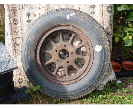 A vintage spoked artillery design lorry Wheel and tyre, 700 x 20, 10 ply rating, five stud.