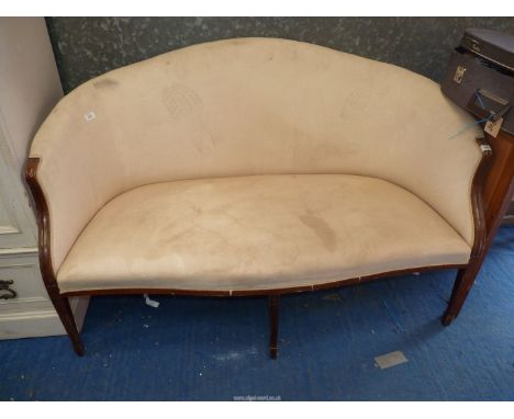 A two seater Salon Sofa with show frame standing on tapering square legs, terminating in spade feet, 55 1/2" wide x 37" high.
