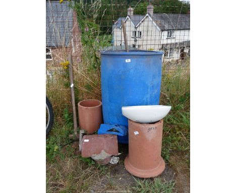 Clay pipes, 205 litres plastic barrel, a small hand basin, shoe last and a sledge hammer.