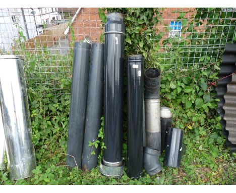 A quantity of enamel 5" diameter flue pipe.