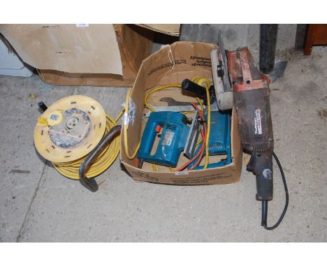 An angle grinder (as seen), 110 volt electric drill, 240 volt jigsaw and 110 extension lead.