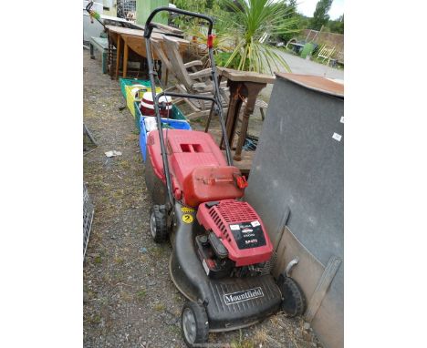 A "Mountfield" self propelled mower with "Briggs and Stratton" SP470 4 stroke petrol engine and grass box.
