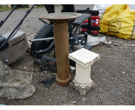 A glazed pipe and a pedestal stand.