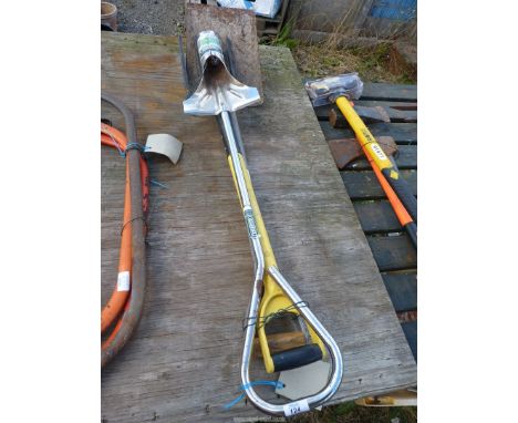 A bulb planter, garden fork and a shovel.