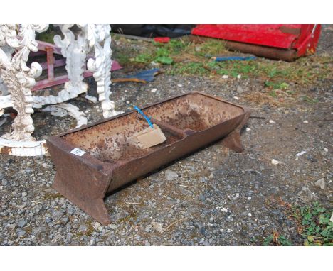 A small cast iron pig trough, 25" wide x 10" depth x 6" deep.