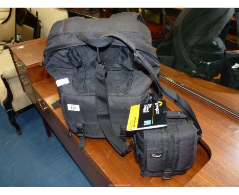 A "Lowepro Adventura" 120 camera/video bag, together with a "Fast Pack" 350 ruck sack, (as new).
