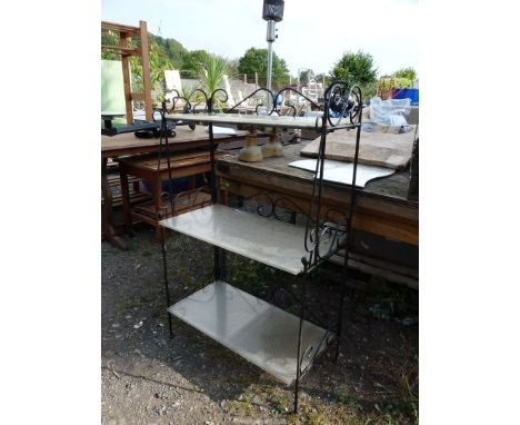 A wrought iron shelf unit with three polycarbonate shelves, 27" wide  x 14" depth x 44" high.