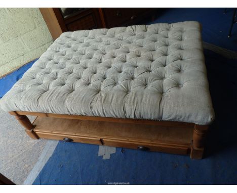 A large upholstered Stool with lower tier shelf and drawer to base, 51'' x 39'' x 18".