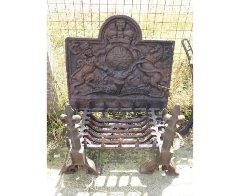 A cast iron fire back and grate, grate 24'' x 13", fire back 28" x 24".