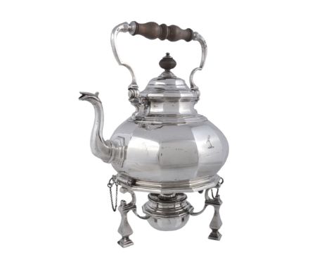 A silver facetted baluster kettle on stand by Alfred James How, London 1910  A silver facetted baluster kettle on stand by Al