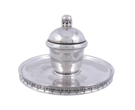 A Danish hammered silver circular inkwell by Georg Jensen  A Danish hammered silver circular inkwell by Georg Jensen,   stamp