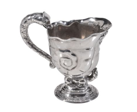 A George II silver cream jug, unmarked, circa 1725, shell-shaped  A George II silver cream jug,   unmarked, circa 1725, shell